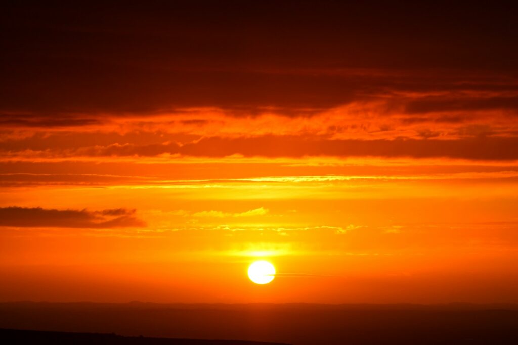 sun setting over the horizon