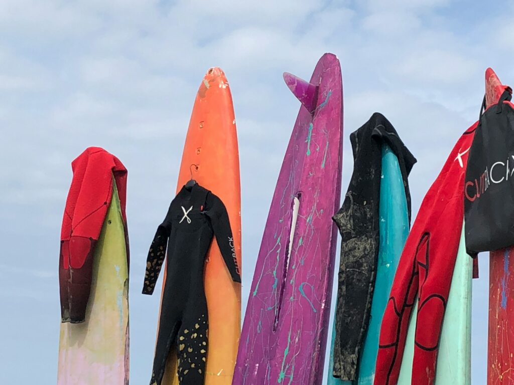 blue orange and yellow surfboard lot