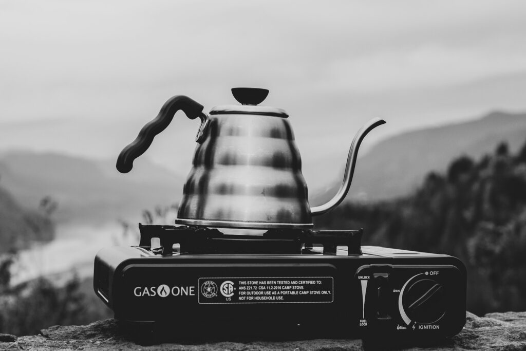 Grayscale photography of stove oven.